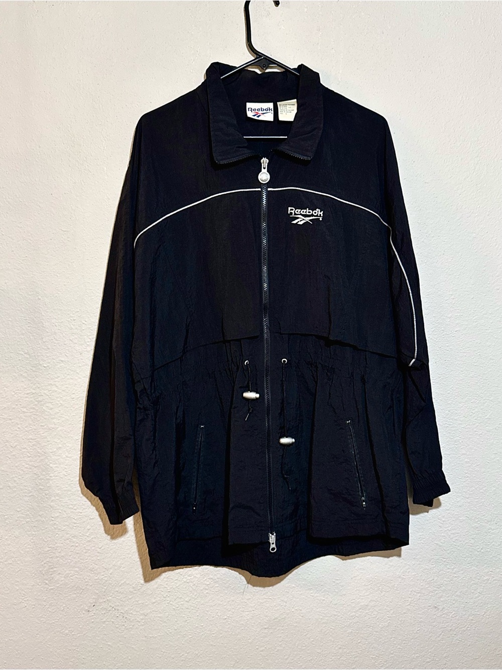 Vintage Reebok Black Lightweight Zip Front Windbreaker with White Piping Size L